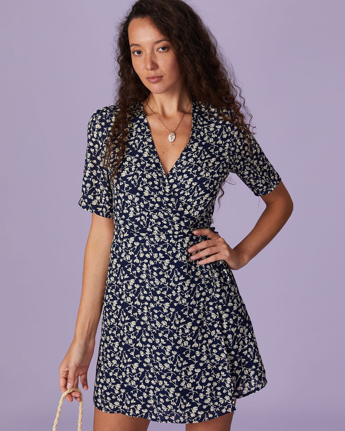 The Navy V Neck Floral Wrap Mini Dress